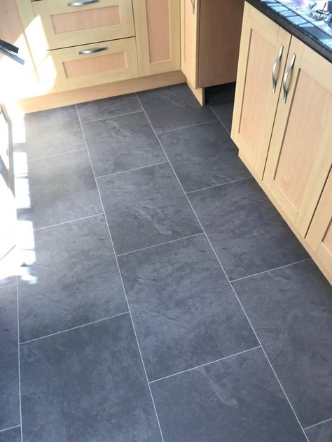 Karndean art select slate Luxury vinyl tile colour Cirrus LM22 with DS10 Concrete grouts strips to give that true slate effect. Slate Luxury Vinyl Tile, Grouted Vinyl Tile, Slate Lvt Flooring, Luxury Vinyl Tile Kitchen, Flooring Ideas Vinyl, Kitchen Floor Tile Design, Black Slate Floor, Grey Blue Kitchen, Slate Tile Floor