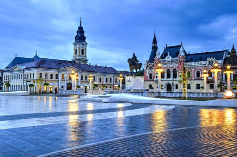 Union square (Piata Unirii) seen at the blue hour in Oradea, Romania © Catalin Lazar / Shutterstock Visit Romania, 1. Mai, Brasov, Most Beautiful Cities, Eastern Europe, Glasgow, Cool Places To Visit, Europe Travel, Romania