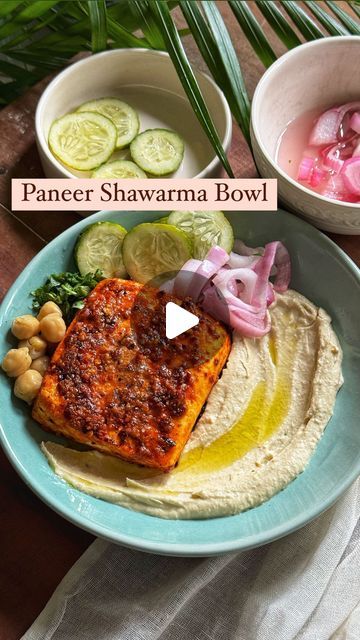 Sneha Singhi Upadhaya on Instagram: "Paneer Shawarma Bowl This dish is my new favourite way to eat paneer and I'm sure you'll love it too. Let's make this. Serves 1 200 gms paneer 1/2 cup thick yoghurt/hung curd 1 tbsp paprika/red chilli powder Salt to taste 2 tsp garlic, finely chopped 1/4 tsp pepper 1/2 tbsp chilli flakes 1 tsp lemon juice 1/2 tsp lemon zest Mix all the ingredients together & coat your paneer well. Let it rest for 10-15 minutes. Heat butter in a pan & cook the paneer till golden brown & charred on both sides. Hummus 1/2 cup boiled chickpeas 3 tbsp tahini 1 tbsp lemon juice Salt to taste 2-3 tbps olive oil 1 tbsp garlic 3-4 ice cubes Blitz all of this together to a smooth & creamy paste. Pickled onions 1 onion, sliced 1/4 cup vinegar 2 tbsp sugar Salt to taste Paneer Bowl, Paneer Shawarma, Shawarma Bowl, Chickpea Fries, Grilled Paneer, Paneer Dishes, Red Chilli Powder, Pickled Onions, Chilli Flakes