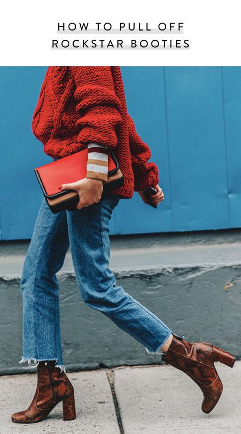 Here's How to Pull Off Those Trendy Rock-Star Booties via @PureWow Look Jean, Walking Down The Street, Pullover Outfit, Denim On Denim, Collage Vintage, Looks Street Style, Street Style Trends, Red Sweater, Fashion Weeks