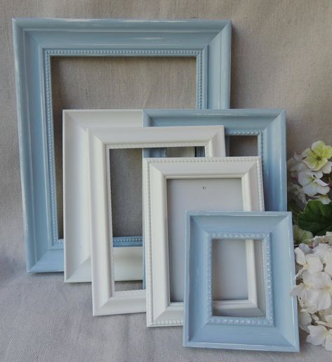 "Presented here are six (6) wood frames (3 blue and 3 white) with pattern borders (use the magnifying glass at the lower right of each photo for closer look)! They have been hand painted in blue and white chalk paint and gently distressed. Perfect wall gallery collage ... wedding photos, nursery room, or office. A. This grouping of six frames feature the following interior measurements: (1) 8\" x 10\" (2) 5\" x 7\" (1) 4\" x 6\" (1) 4\" x 6\" (Has its original easel backing with swivel clips to Gallery Picture Frames, Blue Picture Frame, Nursery Frames, Picture Frame Gallery, Picture Frame Set, Blue Picture Frames, Shabby Chic Frames, Picture Framing, Baby Boy Nursery