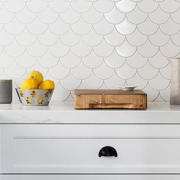 White Kitchen Cabinets with White Fan Tiles Fish Scale Tile Backsplash, Fish Scale Tile Bathroom, White Fish Scale Tile, Mosaic Tile Bathroom Floor, Brick Backsplash Kitchen, Backsplash Tile Design, Fish Scale Tile, Brick Backsplash, Kitchen Backsplash Designs