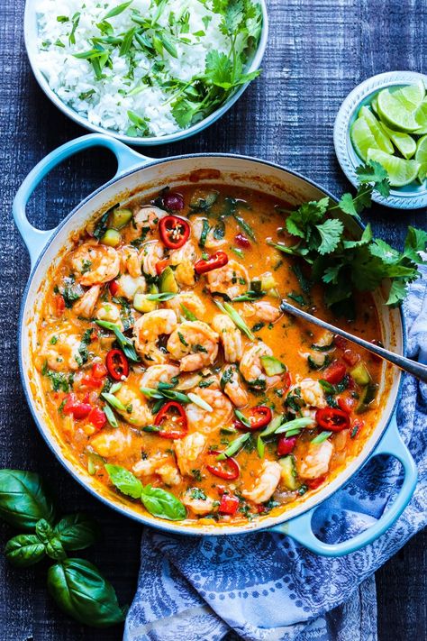 This coconut shrimp curry recipe is loaded with plump shrimp in a coconut red curry sauce that’s on the dinner table in 30 minutes! It's layered in flavor from the spicy Thai red curry paste, onion, garlic, ginger, fish sauce and coconut milk. A super easy, one pot meal that’s full of amazing flavor. Thai Red Prawn Curry Recipe, Red Curry Shrimp Thai Coconut Milk, Curry Simmer Sauce Recipe, Thai Red Curry Shrimp Recipe, Red Pepper Curry, Thailand Recipes, Shrimp Curry Recipe, Coconut Shrimp Curry, Coconut Red Curry