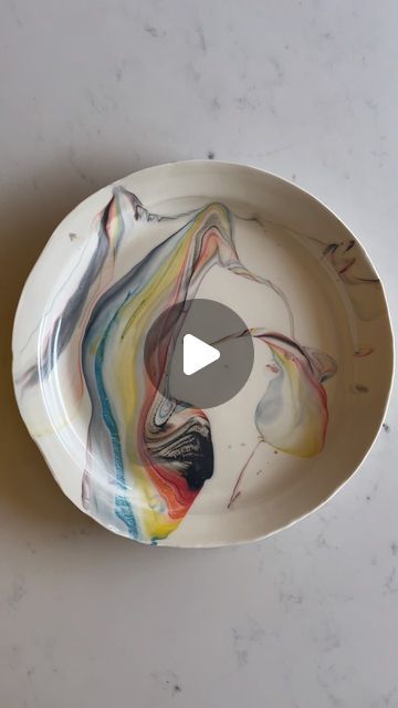 Adrien Miller on Instagram: "This plate caught some especially nice twists of colored porcelain.  The clear glaze made the cyclones of color transparent! Just marveling at the movements of fluid over here.
#glaze #pottery #process #swirl #cyclone #color #tornado #twist #marbled #porcelain #ceramics #plate #glazing #slipware #slabbuilt #makersgonnamake #fluidart #melt #transparent #pourpainting #fluid #craft #handmade" Swirl Glaze Pottery, Marble Plates, Glazes For Pottery, Pour Painting, Fluid Art, Glaze, Swirl, Marble, Porcelain