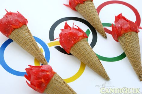 Olympic Torch Cake Pops Olympic Dessert Ideas, Olympic Treats For Kids, Olympic Cupcake Ideas, Olympic Torch Cupcakes, Edible Olympic Medals, Swimming Pool Cake, Cooking Torch, Olympic Theme Party, Olympic Idea