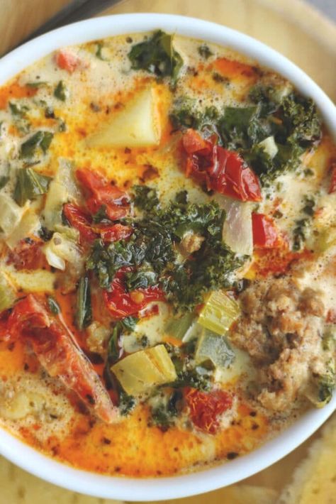 Creamy Tuscan Soup | Zuppa Toscana Recipe Tuscan Potato Soup, Creamy Parmesan Tuscan Soup, Tuscan Stew, Creamy Tuscan Soup, Soup Zuppa Toscana, Mediterranean Soup Recipes, Italian Sausage Potatoes, Meatless Soup, Italian Soups