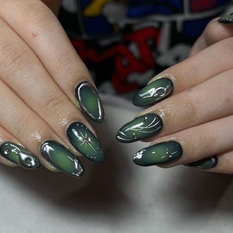 Emerald Green Celestial Nails, Green Nails With Silver Accent, Black Green And Silver Nails, Dark Green Nails With Gems, Acrylic Nail Designs Dark, Green Alt Nails, Dark Green Nails With Chrome, Nails With Dark Green Dress, Dark Blue And Green Nails