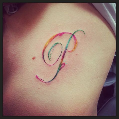 Coloured rib tattoo P Tattoo Letter Design, P Tattoo Letter, P Tattoo, Dear Love, Initial Tattoo, Sai Pallavi, Special Rangoli, Drawing Tattoo, Rib Tattoo