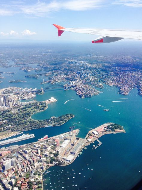 Flying over Sydney Harbor, Australia. Flying To Australia, Airplanes Aesthetic, Plane View, Whatsapp Logo, Plane Window, Australia Vacation, Airplane Window, Sydney Harbour, Surfers Paradise