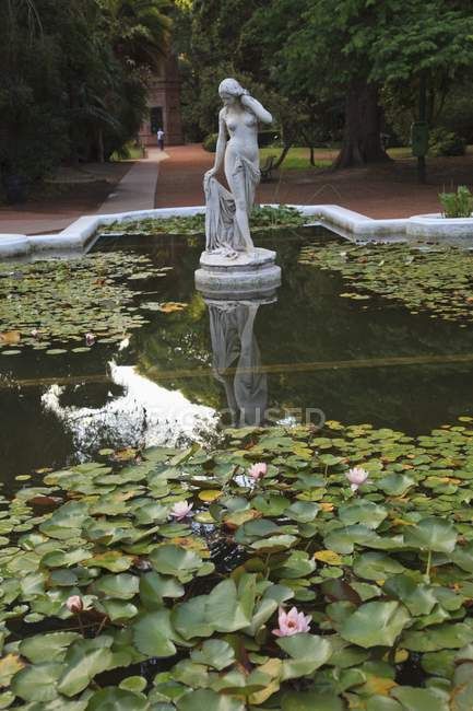 Statue In A Pond In The Palermo Botanical Gardens — nature, jardin botanical - Stock Photo | #164920586 Greek Statue Garden Aesthetic, Garden With Statues, Pond Statues, Statue In Garden, Aesthetic Fountain, Beautiful Fountains, Fountain Statue, Greek Paintings, Outdoor Ponds