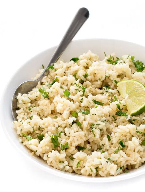 Healthy Cilantro Lime Brown Rice | chefsavvy.com Instant Pot Cilantro Lime Rice, Cauli Rice Recipe, Lime Brown Rice, Cilantro Lime Brown Rice, Lime Cauliflower Rice, Cilantro Lime Rice Recipe, Taco Side Dishes, Lime Rice Recipes, Copycat Chipotle