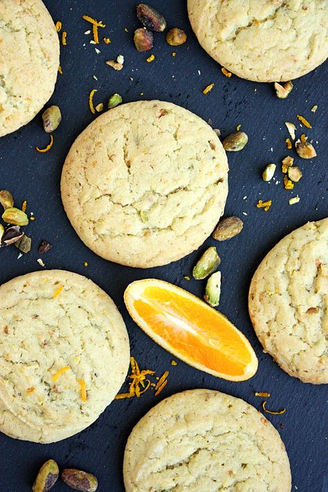 Orange Pistachio Chewy Sugar Cookies ||  Orange zest, freshly squeezed orange juice, and ground pistachios add a flavorful twist to this chewy sugar cookie recipe. The delicious result: light, chewy, nutty, fragrant, orange-infused sugar cookies that are the perfect treat. #mondaysundaykitchen #chewysugarcookies #thebestchewysugarcookies #sugarcookiesrecipe #orangesugarcookies #orangepistachiocookies #orangecookies #pistachiocookies #bestcookierecipes #eastercookies #holidaybaking Lemon Sugar Cookies Recipe, Cookies Orange, Old Fashioned Oatmeal Cookies, Chewy Sugar Cookie, Orange Pistachio, Chewy Sugar Cookie Recipe, Infused Sugar, Pistachio Recipes, Squeezed Orange Juice