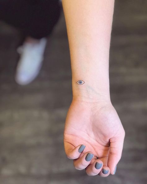 Evil Eye Tattoo Ideas That Are More Of A Blessing Than A Curse Ojo Tattoo, Neon Tattoo, Tattoos Pinterest, Celestial Tattoo, Unique Small Tattoo, Evil Eye Tattoo, Cool Small Tattoos, Subtle Tattoos, Eye Tattoo