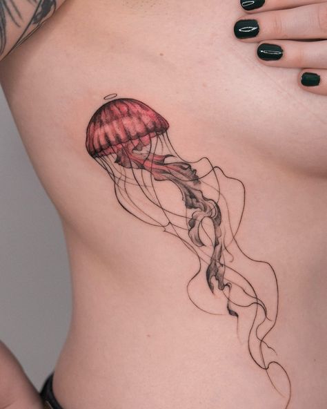 The jellyfish swims peacefully ⭕️ Thank you Denise for your trust 🌸 . . . . #jellyfishtattoo #animaltattoo #sketchtattoo #colortattoos #jellyfish #sketchbook #abstractattoo #lineworktattoo #tattooanimal #berlintattooers #berlintattooartist #berlintattoo #osmanergin Jellyfish Shin Tattoo, Jellyfish Rib Tattoo, Matching Jellyfish Tattoos, Red Jellyfish Tattoo, Jellyfish Sketchbook, Jellyfish Tattoo Color, Moon Jellyfish Tattoo, Jelly Tattoo, Simple Jellyfish Tattoo