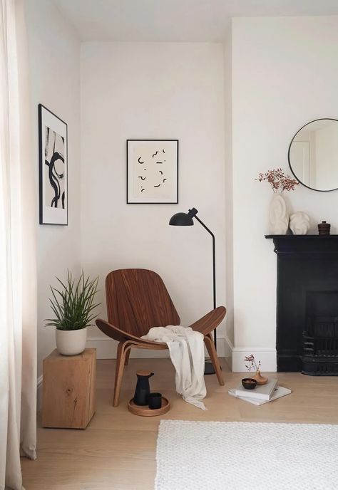 Minimalist Scandinavian interior in beige and white, with mixed woods, black floor lamp and fireplace, and limited-edition rosewood and oak version of Hans J. Wegner's iconic mid-century modern CH07 Shell chair | These Four Walls blog Nicolaj Bo, Cozy Minimal Bedroom, Comfortable Office Chairs, Working From Home Office, House Apartment Ideas, Minimalist Lounge, Amazon Office, Keyboard Ipad, Nordic Lighting