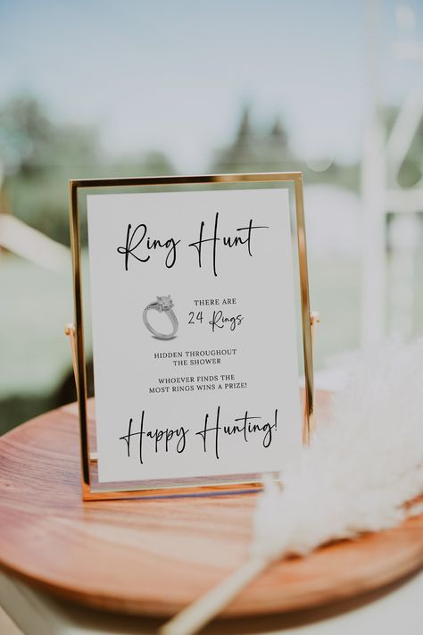 Ring Hunt Bridal Shower Games Instant Download, Ring Hunt Printable Sign, Minimalist Ring Hunt Modern Sign, Editable Fun Bridal Shower Game Please read before ordering! :) What Game is included in this listing: *Ring Hunt Game Sign (5x7 Size) MATCHING GAME BUNDLE HERE: https://www.etsy.com/listing/1517920515/minimalist-bridal-shower-game-bundle MORE GAMES HERE: https://www.etsy.com/shop/meganlugodesignsco?ref=shop-header-name&listing_id=1503759174&section_id=35798112 Purchase this listing and immediately edit the template(s) yourself in Canva. SUPER easy to use right through your browser. Free for you to edit your templates and print in the comfort of your own home or through a print service.  💗 HOW IT WORKS 💗 1. To access your Canva template(s), you will receive a PDF after payment is c Ring Hunt Game Bridal Shower Signs, Ring Hunt Bridal Shower Game, Bridal Shower Game Gifts, Ring Hunt Game, Mexican Fiesta Bridal Shower, Boho Bridal Shower Decorations, Ring Hunt, Fiesta Bridal Shower, Fun Bridal Shower Games