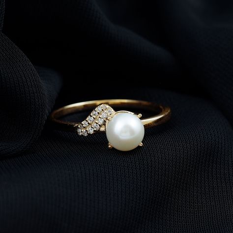 Product Details Make a statement with the stunning Freshwater Pearl Ring, a classic design featuring a round-cut Freshwater Pearl delicately set in a prong setting and accented with sparkling Diamond. A perfect symbol of commitment and love, this Freshwater Pearl Ring is a great choice to celebrate your special bond with your partner while highlighting your unique sense of style. Product Information SKU SHP-RINGS072210057 Weight 2.00 gm (Approximate) FRESHWATER PEARL INFORMATION No.of Stones 1 P Diamond With Pearl Ring, Diamond Ring With Pearl S, White Pearl Ring, Pearl Engagement Ring, Freshwater Pearl Ring, Pearl And Diamond Ring, Ring With Diamond, Sparkling Diamond, Diamond Ring Settings