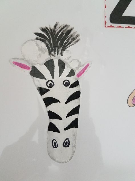 Z is for zebra Zebra Handprint Craft, Zebra Crafts For Preschoolers, Jungle Animal Crafts For Infants, Zebra Footprint Craft, Zebra Crafts For Toddlers, Zebra Footprint, Letter Z Crafts, Jungle Animal Crafts, Baby Footprint Crafts