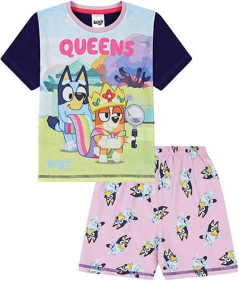 Bluey Girls Queens Short Cotton Pyjama Set in Pink and Blue, Perfect for any little Bluey fan Short sleeve pyjama top with the most adorable print of Bluey and her sister Bingo and shorts with an elasticated waist. 100% Cotton Back, Arms and Shorts, 100% Polyester Front Panel Machine Wash Regular Short Sleeve Available in a wide variety of sizes - 18-24 Months, 2-3 Years, 3-4 Years , 4-5 Years, 5-6 Years, 6-7 Years Sister Bingo, Cotton Pajama Sets, Set Free, Cotton Pyjamas, Sleepwear Robe, Pyjama Set, Pajama Top, Short Pajama Set, Bingo