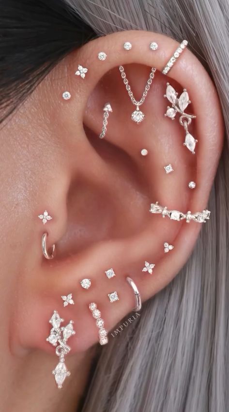 Scorpio Ear Piercing, Full Ear Of Piercings, Peircings Women Idea, Dainty Ear Piercing Ideas, Full Ear Piercing Ideas, Zodiac Ear Piercings, Pretty Ear Piercings Unique, Curated Ear Piercing Ideas, Flat Piercing Ideas