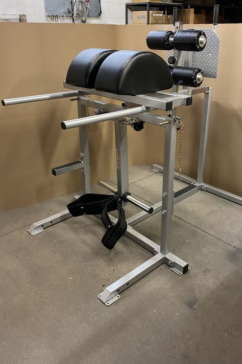 Unleash the ultimate lower back workout with our Reverse Hyper Glute Ham Developer Combo, available in a sleek silver powder-coated finish. 💪✨ This powerhouse piece is designed to take your workout to the next level, blending style and function for an unbeatable training experience. Padding is adjustable to accommodate users. #FitnessGoals #LegDay #powerbodyfitness #fitnessequipment #healthclub #fitnessclub #strengthtraining #strengthequipment #reversehyper #glutehamraise #glutehamdeveloper Lower Back Workout, Reverse Hyper, Weight Rack, Smith Machine, Lower Back Exercises, Free Weight, Health Club, Body Fitness, Fitness Club