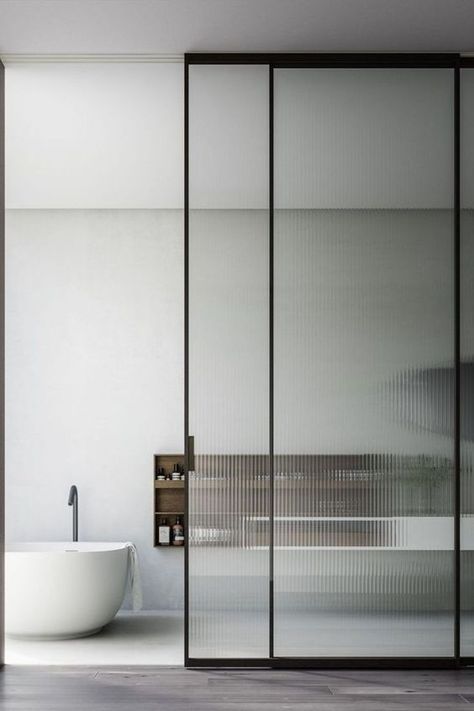 15 Interior Sliding Door Designs You'll Love - Chloe Dominik Sliding Doors Internal, Modern Sliding Doors, Sliding Door Design, Reeded Glass, Interior Design Per La Casa, Glass Doors Interior, Sliding Doors Interior, Glass Bathroom, Bad Design