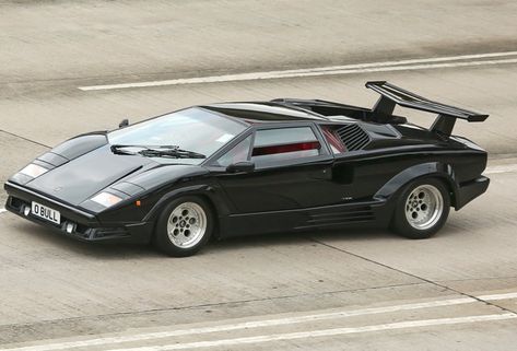 The 15 Most Iconic '70s Cars of the 1970s - Thrillist Computer Moodboard, Cat Roll, 70s Cars, Iconic Cars, Retro Computer, Vinyl Roofing, Lamborghini Miura, Euro Cars, Lamborghini Countach