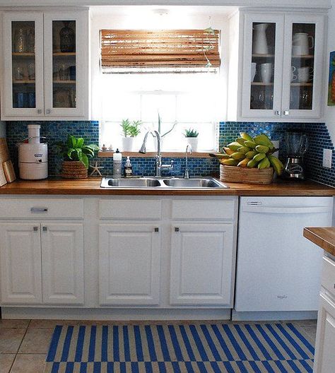 butcher block counter tops in blue and white kitchen | white cabinets, blue backsplash, butcher block counters Kitchen Without Backsplash, Backsplash For White Cabinets, Glass Kitchen Cabinet Doors, Blue White Kitchens, Blue Backsplash, Butcher Blocks, Kitchen Backsplashes, Kitchen White, Top Kitchen