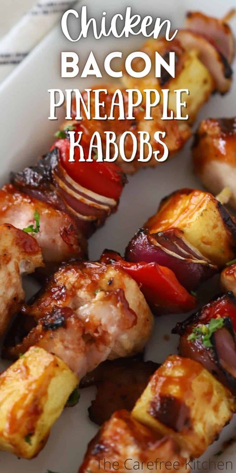 These grilled Chicken Bacon Pineapple Kabobs are salty, sweet, and the perfect addition to any backyard BBQ. Each skewer is packed with crispy bacon, juicy pineapple, grilled chicken, and veggies all tossed with your favorite barbecue sauce. #thecarefreekitchen #kabob #bbq #grilled #chicken #hawaiian #pineapple #chickenkabobs #dinner #appetizer #summer Hawaiian Chicken Bacon Kabobs, Bacon Pineapple Bbq Chicken, Hawaiian Chicken Bacon Pineapple Kabobs, Chicken Bacon Pineapple Kabobs, Ham Kabobs, Chicken And Pineapple Kabobs, Grilled Chicken And Veggies, Appetizer Summer, Chicken Pineapple Kabobs