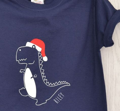 Children's Christmas Dinosaur T Shirt Christmas t shirt #christmastshirt T shirt #tshirt t-shirt #t_shirt t shirts #tshirts t-shirts #t_shirts T shirt design #tshirtdesign T-shirt designs #t_shirtdesign T shirts designs #tshirtsdesigns 4.12 Childrens Christmas Shirts Vinyl, Kids Christmas Jumper Cricut, Dino Christmas Shirt, Kids Christmas Shirts Vinyl, Christmas Shirts Kids, Kids Christmas Shirts, Christmas Shirts Vinyl, Circuit Joy, Kids Christmas T Shirts