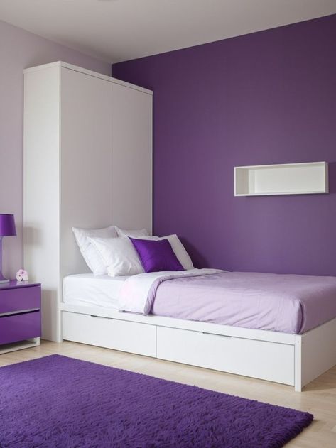 Create a stunning purple accent wall in a modern kids bedroom for a vibrant touch. Pair with sleek and minimalist furniture, like a white platform bed and a matching dresser, to achieve a stylish and contemporary look. Purple Accent Wall, White Platform Bed, Modern Kids Bedroom, Purple Accents, White Platform, Minimalist Furniture, Modern Kids, Platform Bed, Kids Bedroom