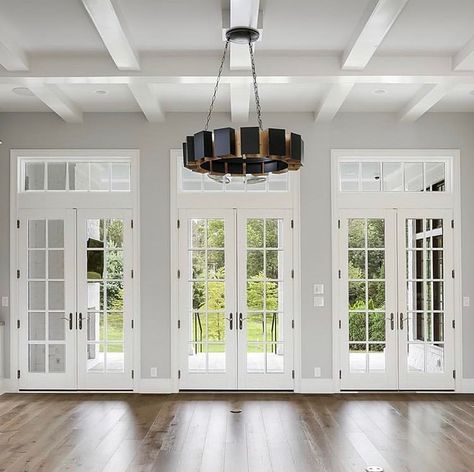 HANNAH on Instagram: “This beautiful great room is the perfect visual inspo for our great room. We have three sets of French doors with transom windows above…” French Doors With Transom, French Doors Living Room, Family Room Windows, Coastal House Plans, French Doors Patio, Transom Windows, Home Additions, Colonial House, Patio Doors