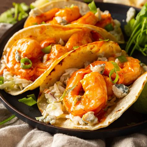 Buffalo Shrimp Tacos Fried Buffalo Shrimp, Buffalo Shrimp Tacos, Slaw For Shrimp Tacos, Cheese Slaw, Shrimp Taco Recipe, Spicy Buffalo Sauce, Healthy Shrimp Tacos, Mexican Cuisine Recipes, Summer Seafood Recipes