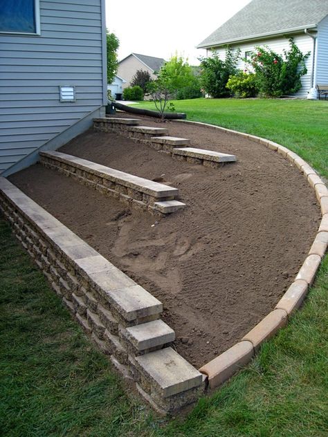 Retaining wall all done | and ready for some planting | Flickr Small Hill Retaining Wall, Garden With Retaining Wall, Retaining Wall Steps Sloped Backyard, Simple Retaining Wall Ideas, Sloped Landscape Ideas, Concrete Retaining Wall Ideas, Retaining Wall Garden, Step Garden, Retaining Wall Patio