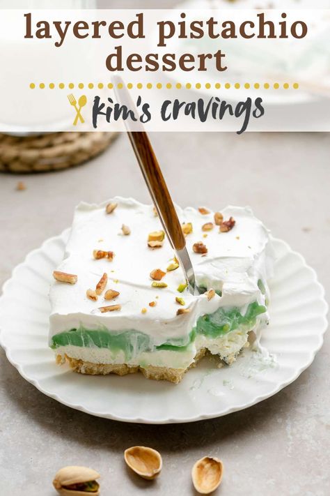 Gorgeous Layered Pistachio Dessert is the most amazing old-fashioned sweet treat passed down from my grandma! It's easy to make with a nutty cookie crust that’s topped with layers of cheesecake filling, pistachio pudding, and Cool Whip. It's always a hit at potlucks, parties and holiday gatherings! Chocolate Pistachio Pie, Pistachio Torte Recipes, Pistachio Lush Dessert, Pistachio Pudding Dessert, Pudding And Cool Whip, Pistachio Pie, Pistachio Dessert Pudding, Cool Whip Desserts, Pistachio Dessert