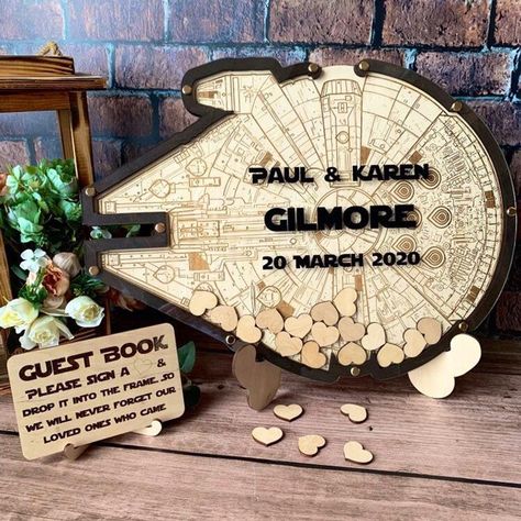 Star Wars wedding guest book alternative Millennium Falcon | Etsy Star Wars Guest Book, Star Wars Wedding Decorations, Wedding Gift Guest, Decoracion Star Wars, Gamer Wedding, Star Wars Wedding Theme, Heart Guest Book, Wooden Wedding Guest Book, Wood Guest Book