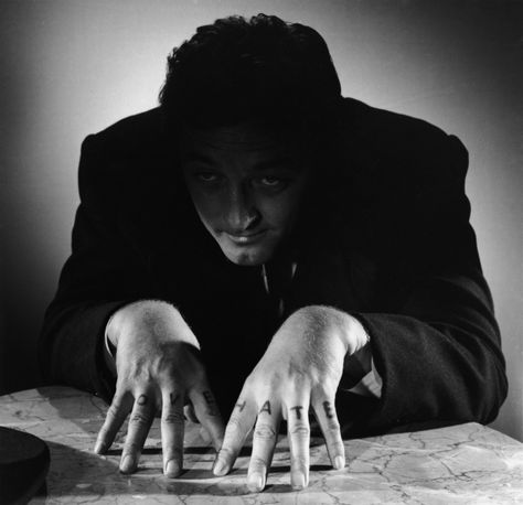 Robert Mitchum in “The night of the hunter” i like the idea of the antag having traits similar to Mitchum's character The Night Of The Hunter, Night Of The Hunter, Robert Mitchum, The Hunter, White Photo, Hands On, A Man, Black And White, White