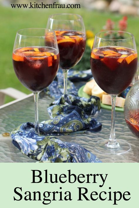 Sip away the summer with our irresistible Blueberry Sangria, a pitcher full of summer delight right from Kitchen Frau! Bursting with fresh blueberries and brimming with festive cheer, this easy-to-follow recipe is guaranteed to be a crowd-pleaser. Indulge in a pour of summer fun, one glass at a time. Blueberry Wine Sangria, Blueberry Sangria Recipes, Blueberry Sangria, Sangria Drink, Blueberry Wine, Strawberry Sangria, Blueberry Vodka, Fruity Wine, Sangria Wine