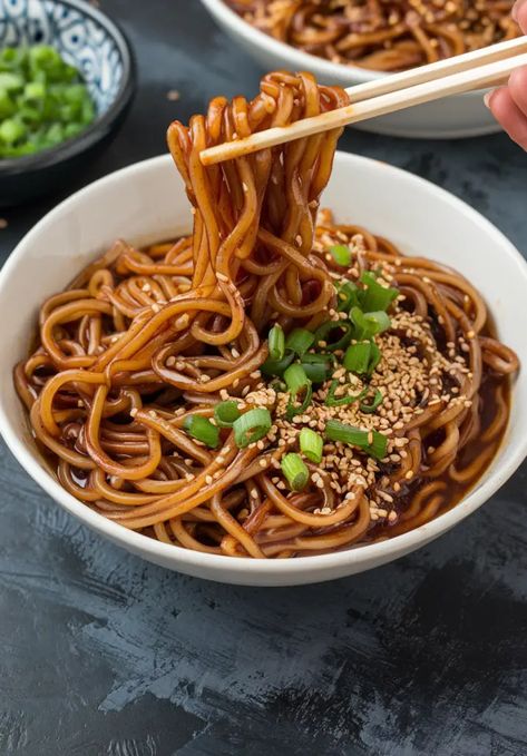 These Easy Saucy Ramen Noodles are the ultimate comfort food! 🍜 Coated in a thick, flavorful sauce, they're ready in just 25 minutes and completely customizable with your favorite veggies, tofu, or mushrooms. Perfect for a quick dinner or lunch! #RamenNoodles #QuickRecipes #EasyMeals #VeganFriendly #AsianFood Soy Sauce Ramen Noodles, Ramen Sauce, Saucy Ramen, Vegan Ramen, Best Comfort Food, Spicy Sauce, Ultimate Comfort Food, Ramen Noodles, Satisfying Food