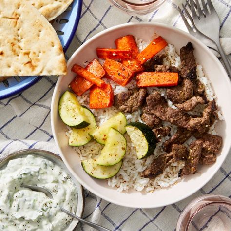 Recipe: Beef Shawarma Bowls with Harissa-Glazed Carrots & Tzatziki Sauce - Blue Apron Roasted Zucchini And Carrots, Carrots Glazed, Beef Shawarma, Roasted Zucchini, Roast Zucchini, Harissa Paste, Spiced Beef, Middle Eastern Dishes, Glazed Carrots