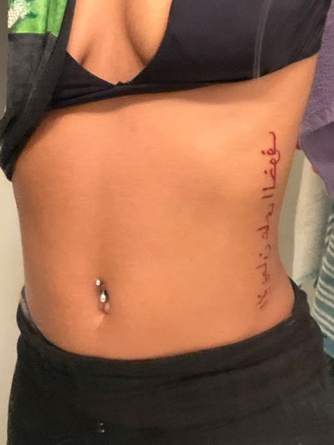 Red Ink Side Tattoo, Red Ink Arabic Tattoo, Red Ribcage Tattoo, Arabic Side Tattoo, Red Ink Tattoos Butterfly, Red Arabic Tattoo, Tattoo Ideas Red Ink, Underboob Tattoos Words, Side Tattoos Women Ribs