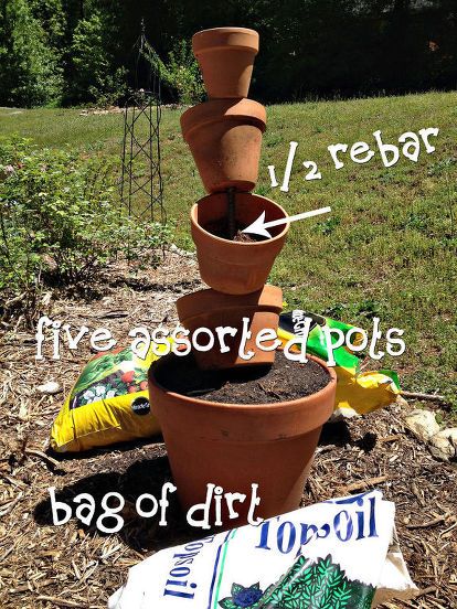 After seeing this easy project displayed at our local Home Depot, my husband & I decided that we couldn't wait for the demonstration class next week and built a cute little planter for our patio. Using a treasure trove of terra cotta pots we discovered in our shed, hubby & I put together this easy topsy turvy planter over the weekend. It took all of 45 minutes to assemble and plant the pots full of color! Topsoil, assorted terra cotta pots, & rebar are all you need to assemble t… Planter Crafts, Topsy Turvy Planter, Herb Garden Planter, Diy Hanging Planter, Terra Cotta Pots, Garden Corner, Colorful Planters, Pot Painting, Modern Plant Stand