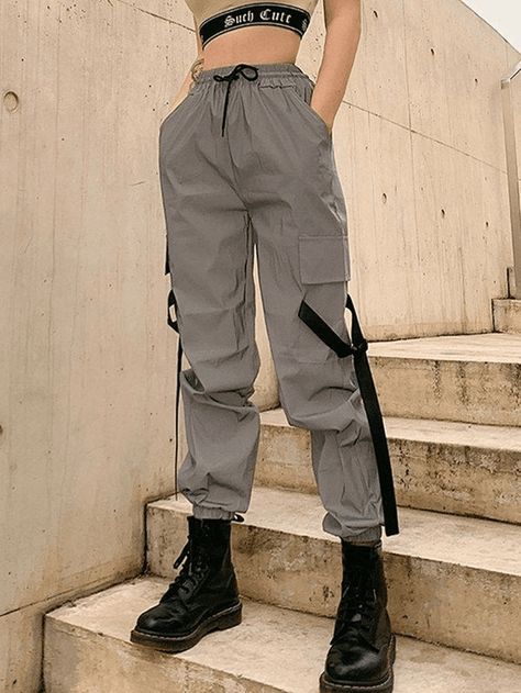 Style: Casual/Street/Y2K/Punk/Hip Pop/Grunge 
 Fabric Content: Polyester, Spandex 
 Fit Type: Relax fit 
 Description: These cargo pants are shaped to a relaxed silhouette, sit to an elasticated drawstring waist design, and feature functional pockets and buckle strap detail on both sides, it will also reflect when exposed to light. Cargo Pants Gray, Parachute Cargo Pants, Parachute Cargo, Street Y2k, Combat Pants, Grey Cargo Pants, Cargo Pants Outfit, Y2k Punk, Baby Tees Y2k