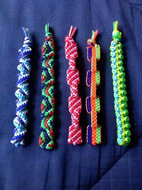 The one on the far right is going to be my next project! Plastic Lace Crafts, Gimp Bracelets, Lanyard Crafts, Plastic Lace, Napoleon Dynamite, String Crafts, Lace Crafts, Lace Bracelet, Paracord Projects