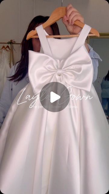 L U X U R Y flower girls dresses on Instagram: "The current number 1 selling Layla Gown . The most elegant and timeless flower girl or communion dress . This is the perfect dress to compliment a brides dress, with its simple yet beautiful design . 
Shop online now https://www.vintagerosebyhannahaj.com.au/products/untitled-apr2_14-56
#vintagerosebyhannahaj #flowergirldress #bridetobe #weddingplanning #weddingdress #2024bride #communiondress" Flower Girl Dresses Simple, Simple Flower Girl Dresses, Flower Girl Gown, Brides Dress, Communion Dresses, Flower Girls, Girl Dress, Number 1, Bride Dress