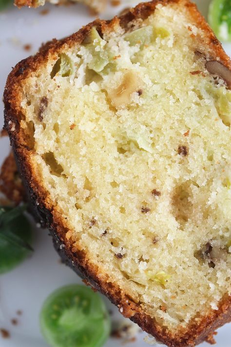 Make this quick green tomato bread to celebrate the change of seasons: it’s moist, sweet with tangy spikes, and utterly delicious! #whereismyspoon #greentomatobread #greentomatocake #greentomatodessert #greentomatorecipe #greentomatoes #quickbread #greentomatoloaf #loafcake #foodbloggerrecipes #goodfood #yummyrecipes Green Tomato Quick Bread, Green Tomato Dessert Recipes, Things To Do With Green Tomatoes, Green Tomato Soup Recipes, Green Tomato Muffins, Green Tomato Recipes Baked, Green Roma Tomato Recipes, Green Tomato Pie Recipe, What To Do With Green Cherry Tomatoes