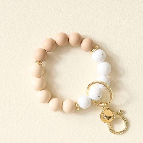 These silicone keychain bracelets are perfect for this summer..soft silicone, sweat proof, and water proof. 🌷 #boutiquegifts #shopallyoops #gradgifts #mothersdaygifts #birthdaygifts Oatmilk Latte, Bridal Candles, Beaded Key Chain, Tyler Candle Company, Barefoot Dreams Blanket, Golf Socks Women, Scout Bags, Clear Purses, Keychain Wristlet