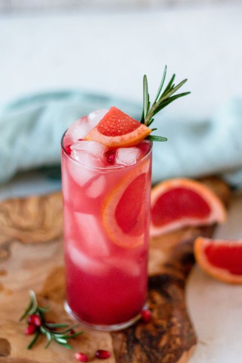 Pomegranate Paloma - Little twist on a classic paloma cocktail made with fresh grapefruit juice instead of grapefruit soda, added pomegranate juice, and a generous pour of tequila. Pomegranate Paloma, Wedding Decisions, Pomegranate Margarita, Paloma Cocktail, Ruby Red Grapefruit, Grapefruit Soda, Rosemary Sprigs, Grapefruit Juice, Pomegranate Juice