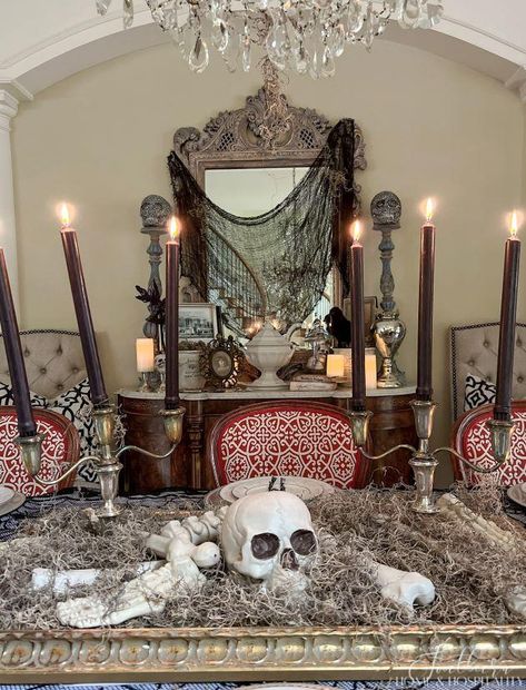 Create this spooky chic Southern Gothic themed dining table and sideboard by combining vintage items you already have with cheap Halloween decorations! Southern Gothic Halloween, Dining Table And Sideboard, Large Glass Candle Holders, Gothic Dining Room, Halloween Dining Room, Halloween Tour, Halloween Themed Food, Cheap Halloween Decorations, Spooky Chic