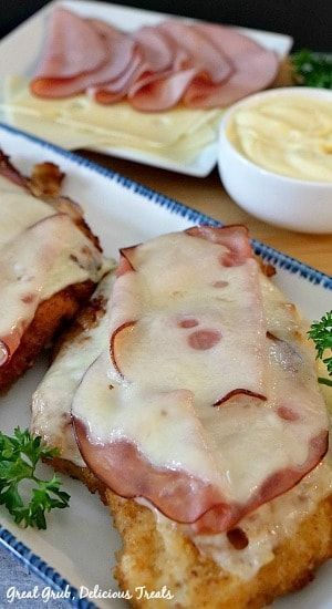 Malibu Chicken is a delicious fried chicken recipe that is topped with ham and melted swiss cheese and is delici… | Chicken dishes recipes, Recipes, Chicken entrees Chicken Malibu Recipes, Chicken With Ham And Cheese Baked, Chicken Ham And Cheese Recipe, Yum Makers Recipes Chicken, Chicken With Ham And Swiss Cheese, Malibu Chicken Sandwich, Swiss Cheese Recipes Main Dishes, Ham Chicken Recipes, Meat Meals Ideas Main Dishes